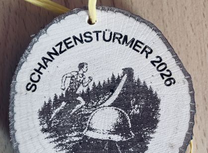 Holzmedaille für die Teilnehmer am Feuerwehrlauf